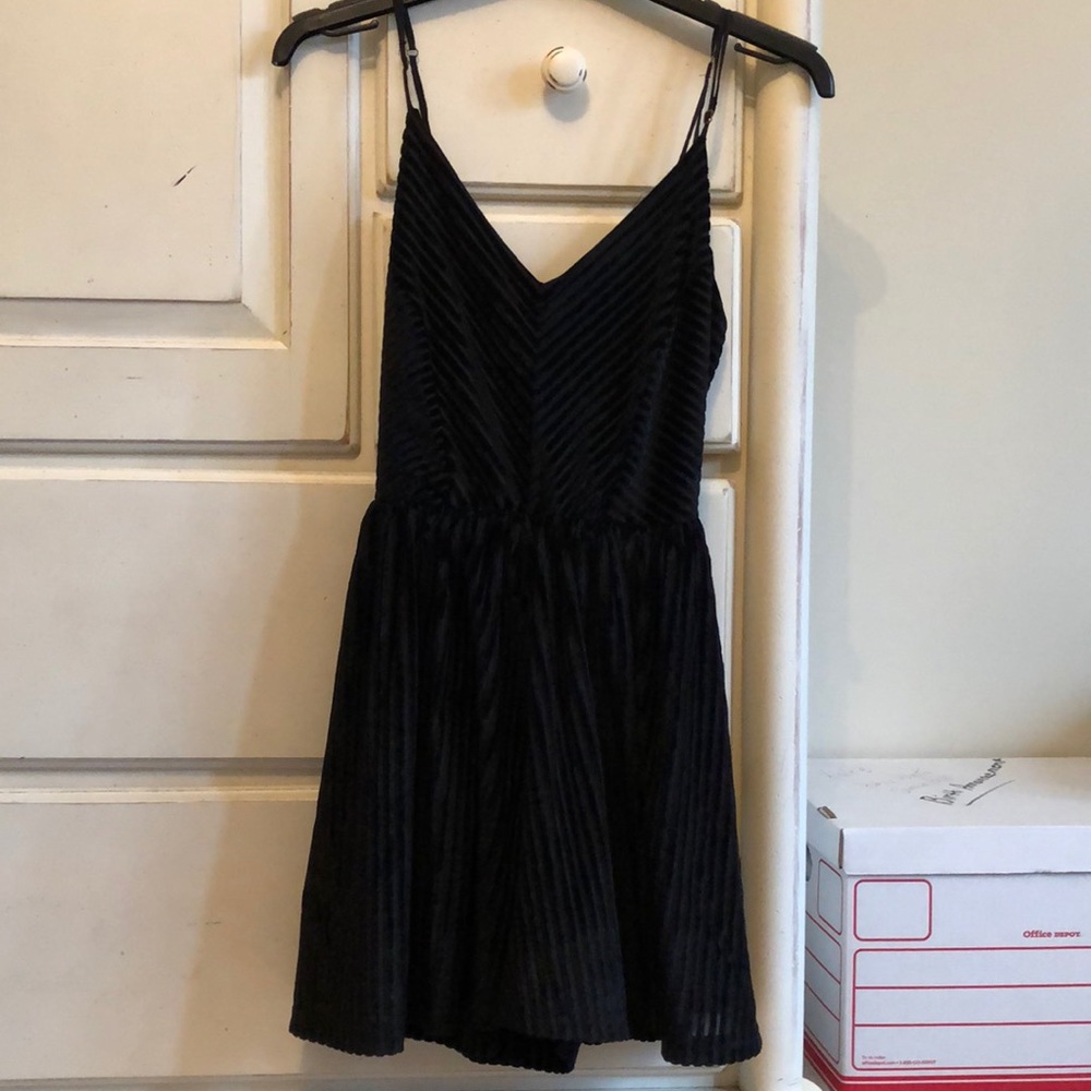 Black velvet romper with line pattern